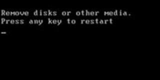 重装win7系统开机黑屏 黑屏提示Remove disks or other media怎么办